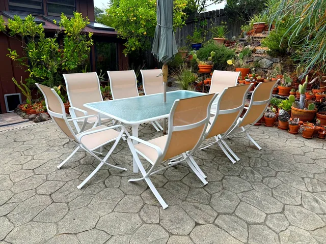 Restored Brown Jordan patio set with gloss-white frames and tan slings