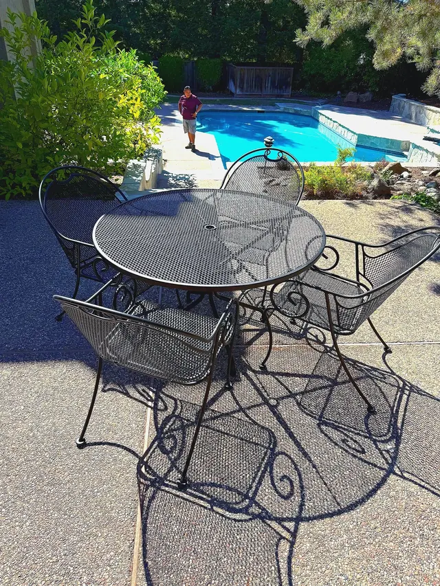 Restored wrought-iron metalwork powder coated satin black